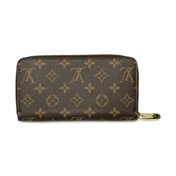 LOUIS VUITTON Brown Monogram Wallet - Picture 1 of 7